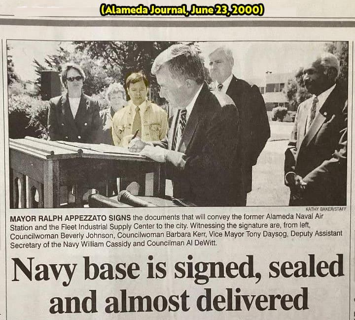 Alameda Journal clipping from June 23, 2000, headlined “Navy base is signed, sealed and almost delivered”: Mayor Ralph Appezzato signs the documents conveying the former Alameda Naval Air Station and the Fleet Industrial Supply Center to the city, witnessed by Councilwoman Beverly Johnson, Councilwoman Barbara Kerr, Vice Mayor Tony Daysog, Deputy Assistant Secretary of the Navy William Cassidy and Councilman Al DeWitt.