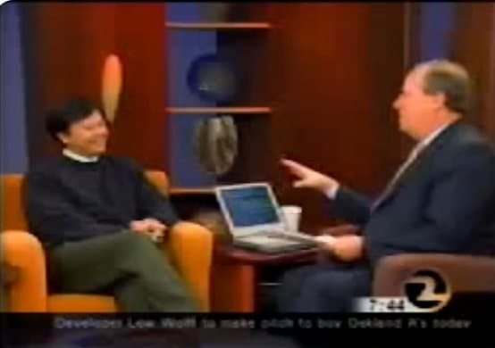 Still from the KTVU Channel 2 morning show: Tony Daysog, seated in an orange armchair, talks with the host.